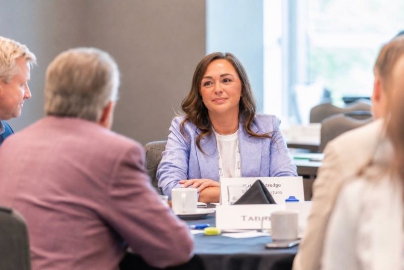 Katy Aldredge in a professional meeting